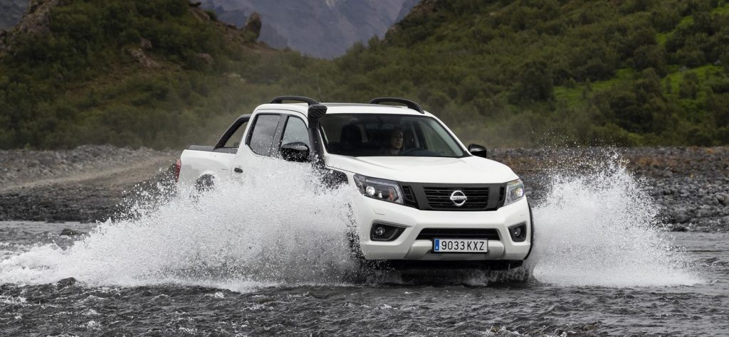 Nissan Navara Off-Roader AT32 splashes through a river