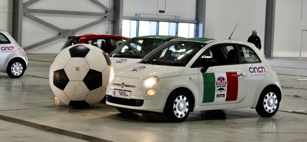 British Motor Show with football and new Musso